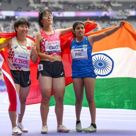 India's Preethi Pal celebrates after winning bronze medal in the women's 100m India's Preethi Pal celebrates after winning bronze medal in the women's 100m