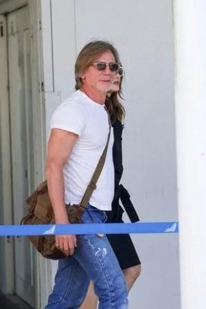 Daniel Craig sports long locks, looks unrecognisable as he touches down in Venice