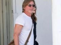 Daniel Craig sports long locks, looks unrecognisable as he touches down in Venice