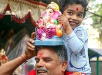 Bengaluru: People shop for Gowri and Ganesha idols on the eve of the Ganesh Chaturthi festival