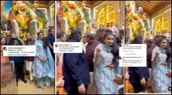 'Inappropriate, she looks uncomfortable': Mukesh Ambani grabs Radhika Merchant's waist, pulls her back at crowded Lalbaugh cha raja pandal; gets slammed