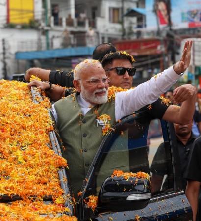 Prime Minister Narendra Modi during a roadshow in the holy town of Katra in Reasi district of Jammu and Kashmir Prime Minister Narendra Modi