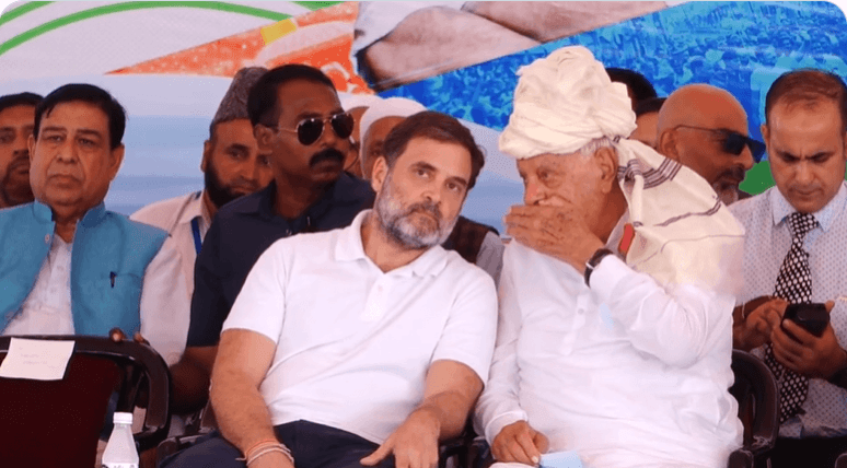 File Picture: Congress leader Rahul Gandhi discussing some important issue for National Conference leader Dr. Farooq Abdullah during an election rally in Surankote area of J&K's Poonch district Rahul Gandhi