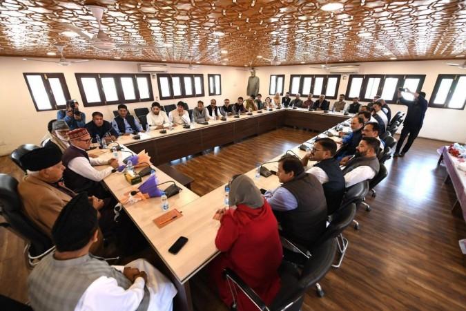 Former Chief Minister Dr. Farooq Abdullah chairing a meeting of newly elected MLAs of the National Conferencde at Srinagar Meeting of NC