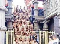Photo of cops violating Sabarimala temple traditions goes viral; report sought