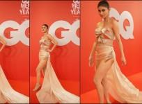 'Awful, she looks uncomfortable': Mouni Roy goes bold in gold bodice, thigh-high slit skirt; gets trolled