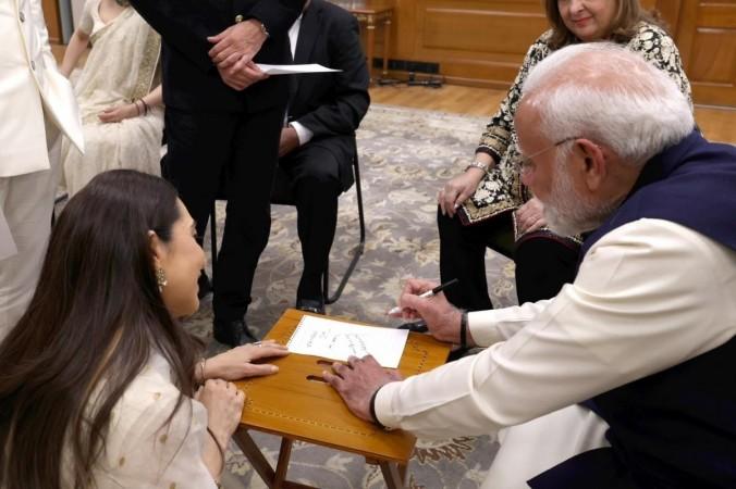 Picture of the day: PM Modi signs autograph for Jeh , Taimur; Kareena Kapoor, Alia Bhatt, Ranbir Kapoor, Saif Ali Khan and Kapoor clan meet PM Narendra Modi in Delhi Picture of the day: PM Modi signs autograph for Jeh , Taimur; Kareena Kapoor, Alia Bhatt, Ranbir Kapoor, Saif Ali Khan and Kapoor clan meet PM Narendra Modi in Delhi