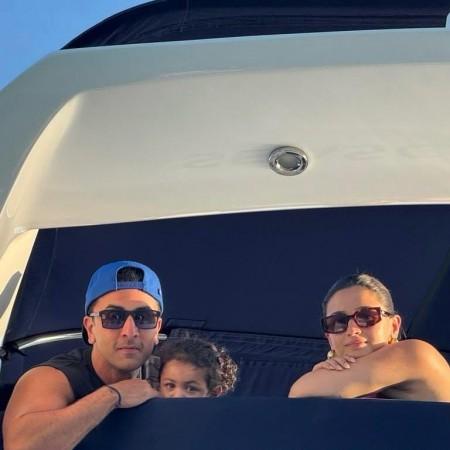 Of Cuddles, cuteness':Ranbir Kapoor kisses Alia Bhatt; Raha looks grumpy as they ring in New Year in Thailand [Pics]