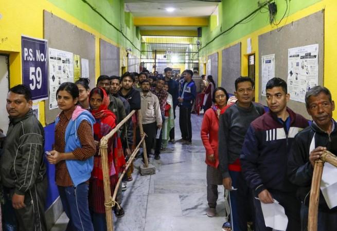 Delhi Assembly poll turnout touches 46.55 per cent Delhi dangal: Higher voting in trans-Yamuna areas till 1 pm; Sisodia alleges wrongdoings