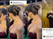'Vulgar camera angle: Paparazzi slammed for inappropriate zoom-in on Nora Fatehi's plunging neckline as she clicks selfies
