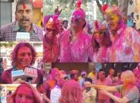 Foreign tourists join the Holi festivities in Varanasi