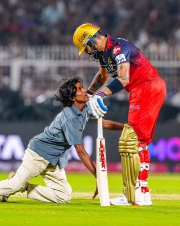 IPL 2025: Virat Kohli hugs fan who breached security to touch his feet during KKR vs RCB clash [Watch]