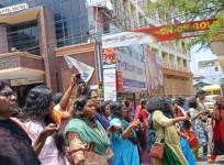 Kerala Asha workers cut hair as pay hike protest enters 50th day