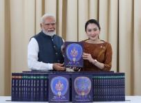 PM Modi presented with 80-volume World Tipitaka phonetic recitation by Thai counterpart