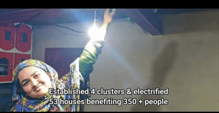 A female of Simari village of J&K's Kupwar district celebrating electrification of her house Simari village