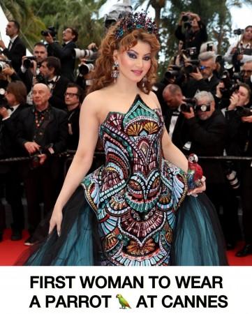 Cannes 2025: Urvashi Rautela goes bold in multi-coloured, long trail gown; carries parrot clutch worth Rs 4 lakh; fans say 'Awful make-up, tacky outfit ' Cannes 2025: Urvashi Rautela goes bold in multi-coloured, long trail gown; carries parrot clutch worth Rs 4 lakh; fans say 'Awful make-up, tacky outfit '