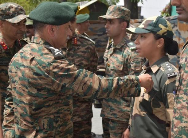 Chief of Army Staff, General Upendra Dwivedi, awarding Border Security Force (BSF) Assistant Commandant Neha Bhandari with the Commendation Disc for her bravery during Operation Sindoor. Neha Bhandari
