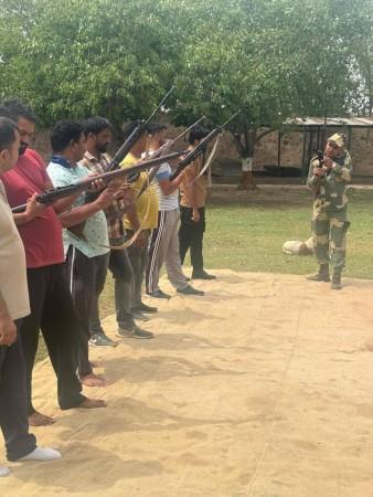 Troopers of the BSF imparting arms training to Village Defence Guards of border areas of Jammu BSF