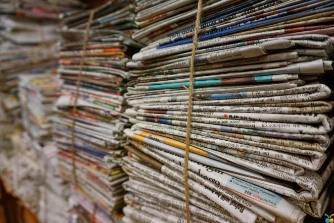 Stack of newspapers Newspapers