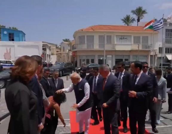 Cyprus leader touches PM Modi's feet in touching gesture of respect Cyprus leader touches PM Modi's feet in touching gesture of respect