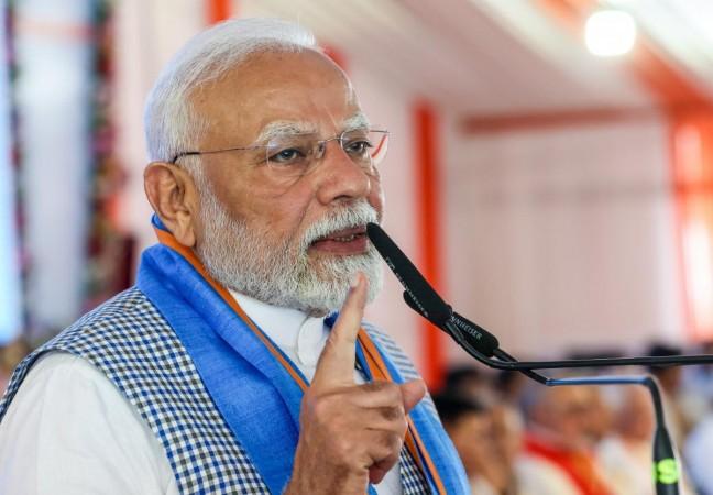 PM Modi slams RJD for 'insulting' Ambedkar during Lalu Prasad Yadav's birthday celebration PM Modi slams RJD for 'insulting' Ambedkar during Lalu Prasad Yadav's birthday celebration