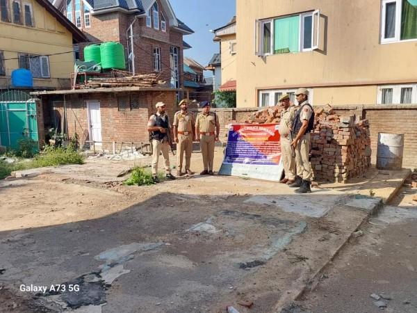 J&K Police attach property of terror associates in Srinagar property attached