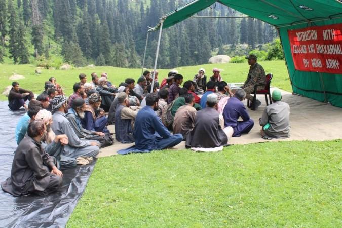 Army officers interacting with Gujjar-Bakerwals in a village in border district of Rajouri Interaction