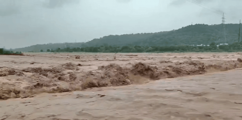 A view of overflowing Basantar river of Samba district in J&K Basantar river