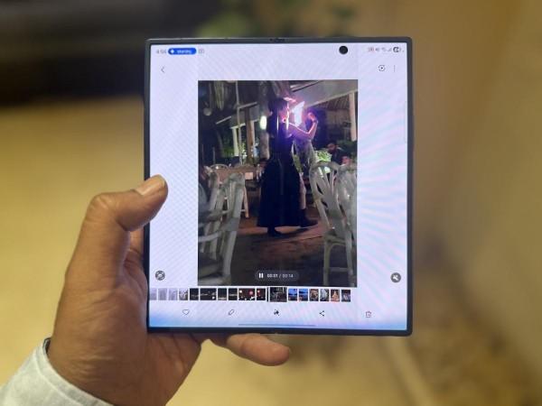 Galaxy Z Fold7 review: Gemini Live works flawlessly to explain what I'm watching on the screen, in this case a fire show performed by an artist. Galaxy Z Fold7 review