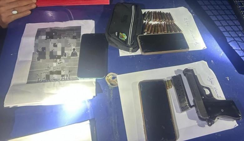 Arms recovered from three terrorists arrested in north Kashmir's Handwara area Recovery