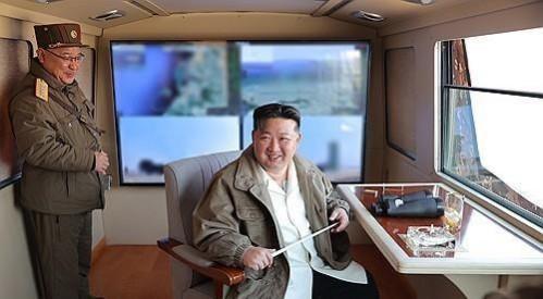 North Korea's Kim supervises test-firing of new air defence missiles North Korea's Kim supervises test-firing of new air defence missiles