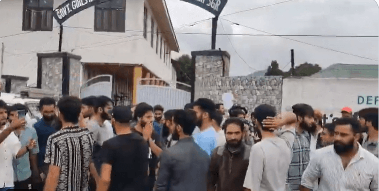 Aspirants of Junior Engineer (Electrical) protest outside an examination centre in Kashmir over alleged allegation of leakage of question paper. Protest