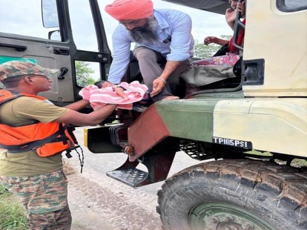 Army's Heroic Rescue in Flood-Hit Northern India Army's Heroic Rescue in Flood-Hit Northern India