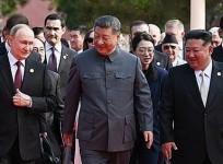 North Korea's Kim Jong-un joins Putin and Xi at military parade, first such gathering in 66 years
