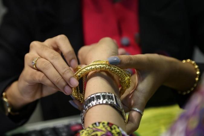 Gold, silver prices hit record high amid global uncertainties Gold, silver prices hit record high amid global uncertainties