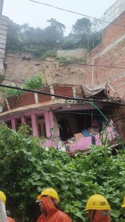 A damaged house in the Kullu district of Himachal Pradesh where six workers from Kashmir are feared to be died after landslide Kulu landslides