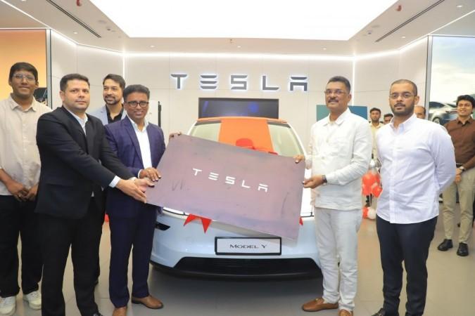 Maharashtra transport minister becomes first Tesla Model Y owner in India, vows to raise awareness about EVs Maharashtra transport minister becomes first Tesla Model Y owner in India, vows to raise awareness about EVs