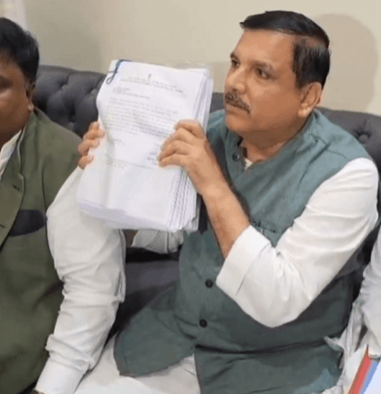 AAP leader Sanjay Singh showing above 800-page dossier of J&K Police against MLA Mehraj Malik Sanjay Singh