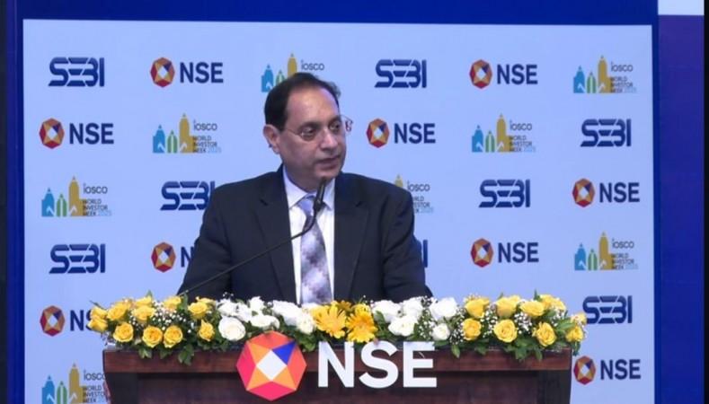 SEBI chief warns investors on fraudsters offering guaranteed returns SEBI chief warns investors on fraudsters offering guaranteed returns