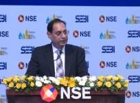SEBI chief warns investors on fraudsters offering guaranteed returns