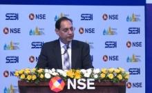 SEBI chief warns investors on fraudsters offering guaranteed returns