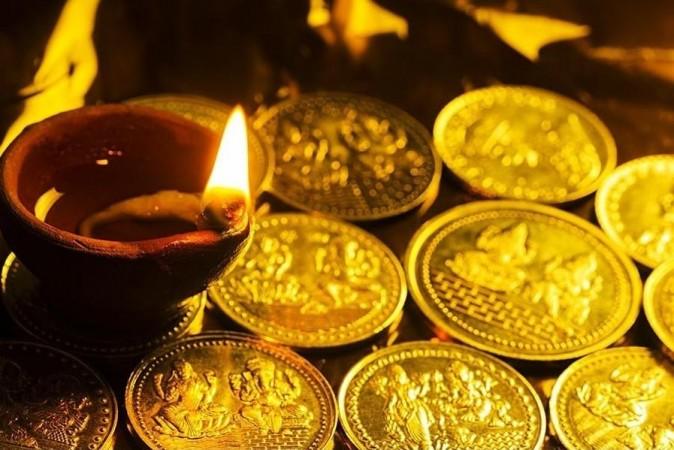 Gold shines on softer dollar; prices rise over 0.7 pc on MCX Gold shines on softer dollar; prices rise over 0.7 pc on MCX