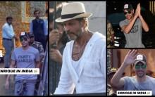 Enrique Iglesias touches down in Mumbai in 'Party Naked' tee; greets paps with namaste, to reportedly collaborate with SRK for King