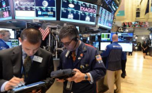 US markets tumble as tech stocks fall, investors await key economic data