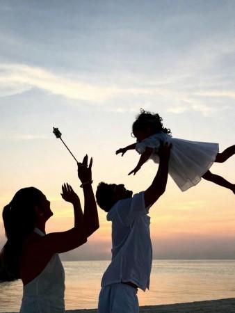 Alia Bhatt took to her Instagram account to wish fans and followers a Happy New Year. In the photo, Alia, her husband Ranbir Kapoor, and daughter Raha are all dressed in white outfits. Ranbir can be seen playing with Raha, while Alia cheers them on, holding what appears to be a toy fairy wand. Alia Bhatt took to her Instagram account to wish fans and followers a Happy New Year. In the photo, Alia, her husband Ranbir Kapoor, and daughter Raha are all dressed in white outfits. Ranbir can be seen playing with Raha, while Alia cheers them on, holdi
