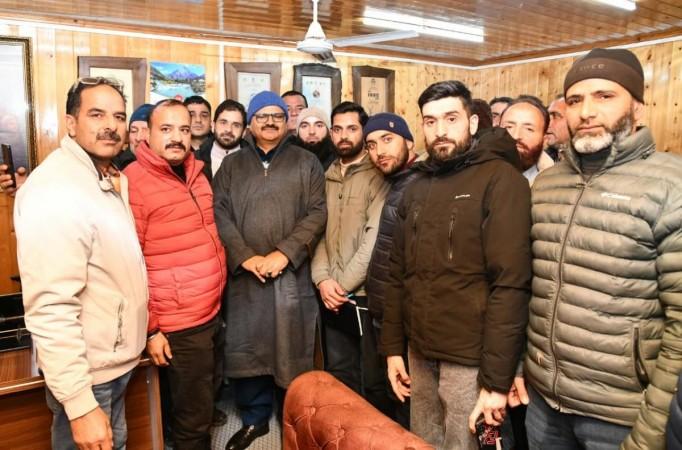 J&K's cabinet minister Javid Ahmed Rana (middle) meeting with a delegation. Javid Rana