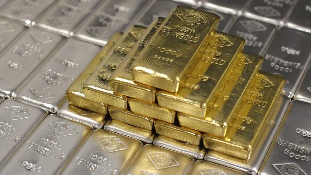 Gold, silver prices ease amid profit booking at record levels