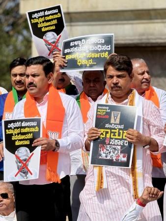 The protest, led by Opposition Leader R. Ashoka and BJP State President B.Y. Vijayendra, involved MLAs and MLCs holding placards and raising slogans against the Congress-led government. Ashoka alleged widespread corruption in the Excise Department, includ