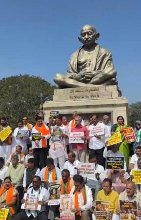 The protest, led by Opposition Leader R. Ashoka and BJP State President B.Y. Vijayendra, involved MLAs and MLCs holding placards and raising slogans against the Congress-led government. Ashoka alleged widespread corruption in the Excise Department, includ