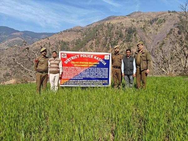 Cops attaching property of a Pakistan-based terror handler in Kathua district Seized property